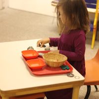 Toddler girl sorting