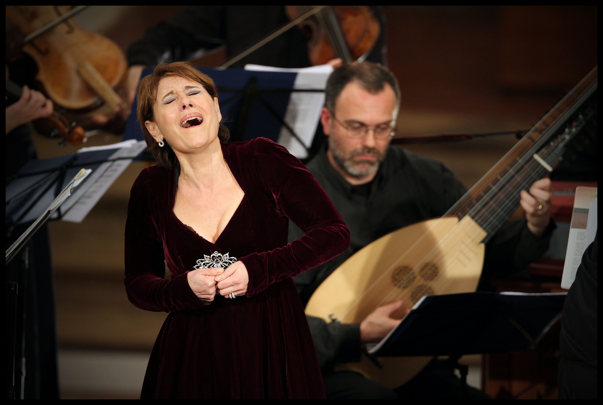 Woman singing opera on stage