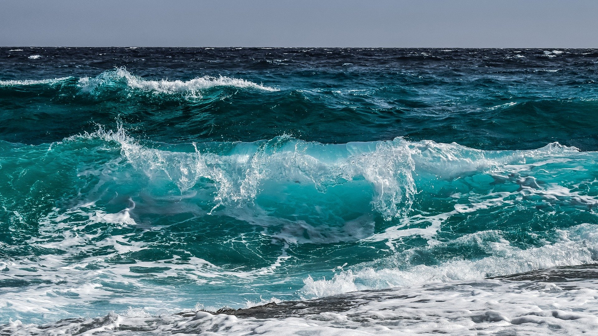 Ocean waves about to crash onto the shore